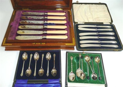 Lot 203 - Two cased sets of coffee spoons, a cased set of fish knives and forks and a cased set of fruit...