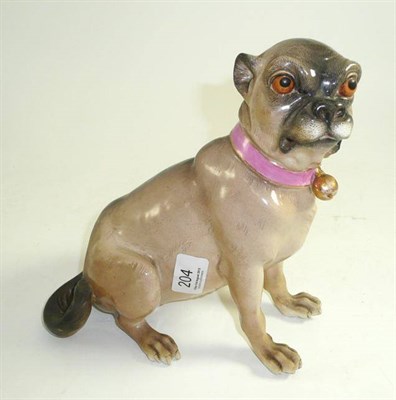 Lot 204 - A late 19th century German porcelain model of a pug bitch in the Meissen style, 23cm (restored)