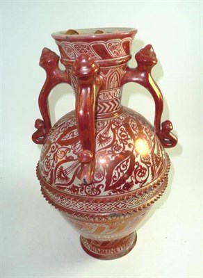 Lot 210 - A Cantigalle copper-red decorated vase with influences of De Morgan, with four scrolled lug...