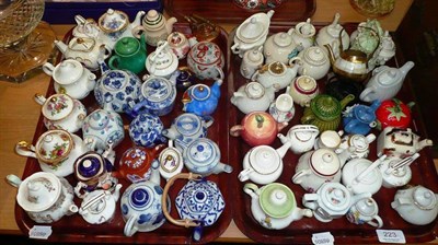 Lot 223 - Two trays of assorted miniatures teapots, souvenir teapots etc