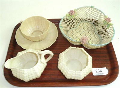 Lot 234 - Belleek four strand woven basket, tea cup and saucer, sugar bowl and jug