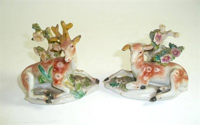 Lot 245 - A pair of late 18th century Derby figures of a stag and doe, damaged