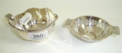 Lot 260 - A pierced silver quaiche and a silver cream jug