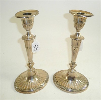 Lot 273 - Pair of Edwardian silver Neoclassical candlesticks loaded