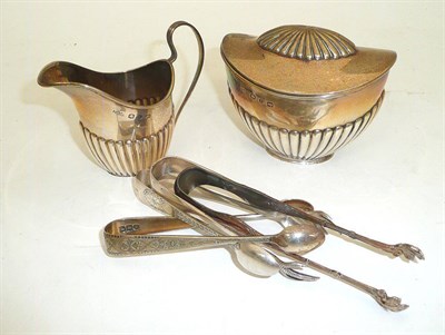 Lot 283 - Silver sugar basin, cream jug and three pairs of tongs