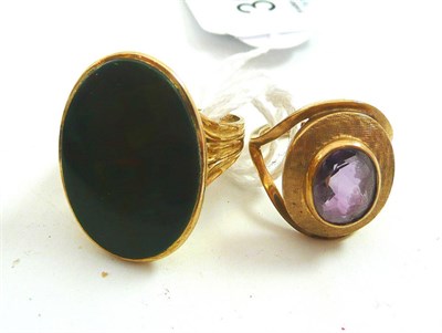 Lot 306 - A 9ct gold bloodstone signet ring and a 9ct gold amethyst ring