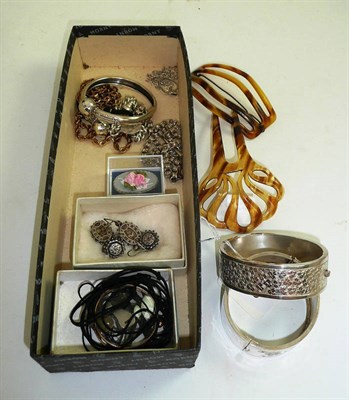 Lot 316 - Two silver bangles, hair combs, a jet brooch, silver chains, lorgnettes etc