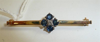 Lot 340 - A diamond and sapphire cluster brooch