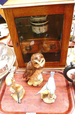 Lot 364 - An Edwardian oak smoker's cabinet, a Royal Worcester porcelain group of Blue Tits and another...