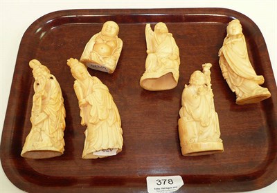 Lot 377 - Five Oriental carved whale tooth figures and a Buddha, circa 1920 (6)