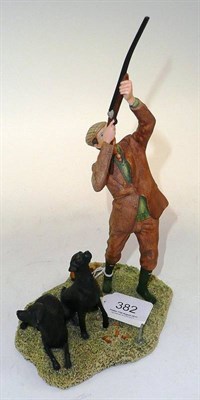 Lot 381 - A Border Fine Arts figure 'Reaching for the High Bird' shooting with black labradors