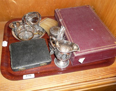 Lot 416 - A collection of silver including a Chester cream jug, three piece dressing table set, twelve...