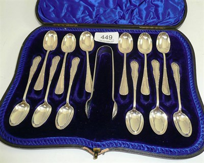 Lot 449 - Twelve silver teaspoons and tongs, cased