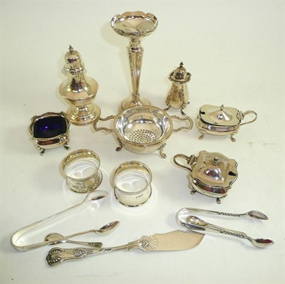 Lot 455 - Silver cruet, two napkin rings, pepper, strainer, two trays and butter knife