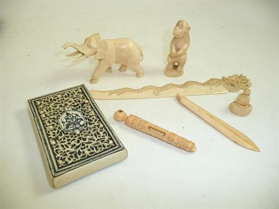 Lot 460 - Ivory card case, elephant, paper knife, monkey etc (6)