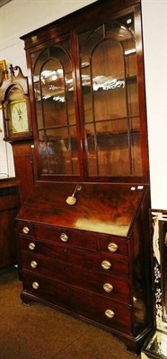 Lot 520 - Georgian mahogany bureau bookcase