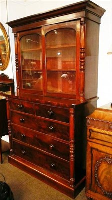 Lot 523 - Victorian mahogany glazed bookcase over a four height chest of drawers