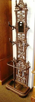 Lot 537 - A Victorian cast iron hall/stick stand in the Coalbrookdale manner, with inset mirror panel