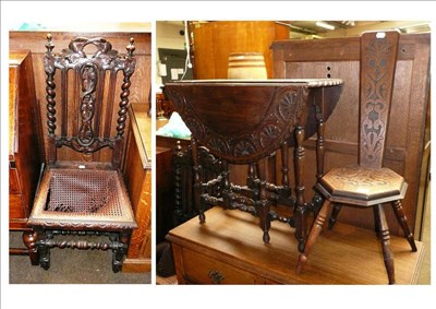 Lot 542 - A carved oak gateleg table, torchere, spinning chair and a carved oak chair