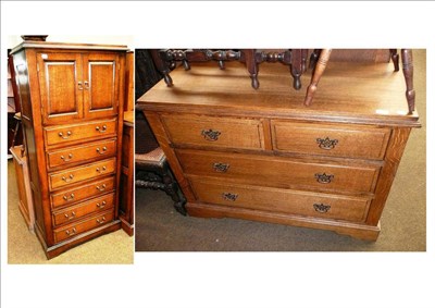 Lot 543 - A reproduction oak three height chest of drawers and an oak tallboy in the style of Titchmarsh...