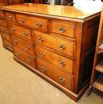 Lot 554 - A large oak chest of drawers, Titchmarsh and Goodwin style