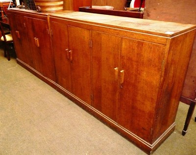 Lot 555 - A pair of oak 20th century cupboards