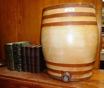 Lot 556 - A large Doulton stoneware spirit barrel and eight decorative bindings