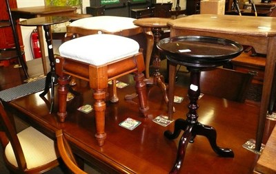 Lot 557 - A pair of mahogany occasional tables, a walnut shell stool with shell capped legs, another,...