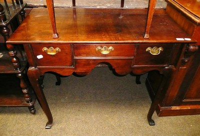 Lot 569 - A 18th century and later lowboy