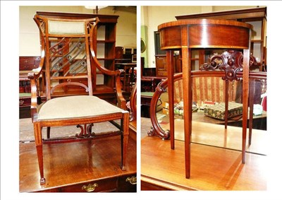 Lot 570 - An Edwardian inlaid mahogany elbow chair and a small D-end side table