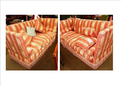 Lot 582 - A pair of Parker Knoll style drop end sofas with striped upholstery