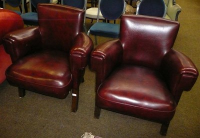 Lot 594 - A pair of Art Deco style tub chairs