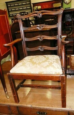 Lot 606 - A 19th century carved oak Georgian style child's open armchair with silk upholstered drop in seat