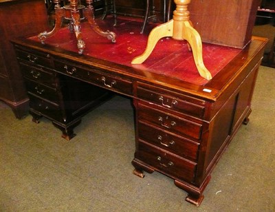 Lot 614 - An early 20th century mahogany pedestal desk