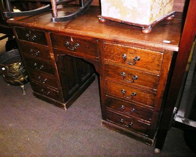 Lot 626 - A pine pedestal desk