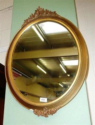 Lot 633 - A gilt framed oval mirror