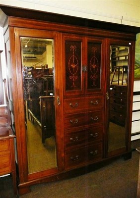 Lot 637 - A large Edwardian mahogany satinwood banded wardrobe and a bedside cupboard