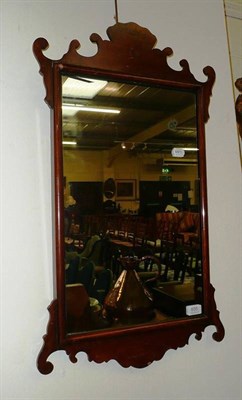 Lot 655 - A Georgian style fret carved mirror