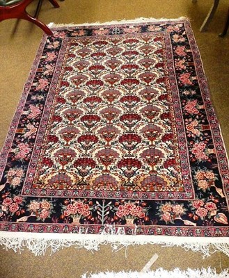 Lot 659 - A Kashmir wool and silk rug