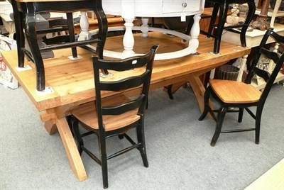 Lot 785 - Modern plank top table and six ladder back chairs