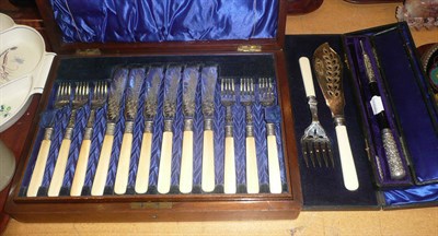Lot 7 - A cased silver and ebony conductor's baton, a cased set of twelve fish knives and forks, etc