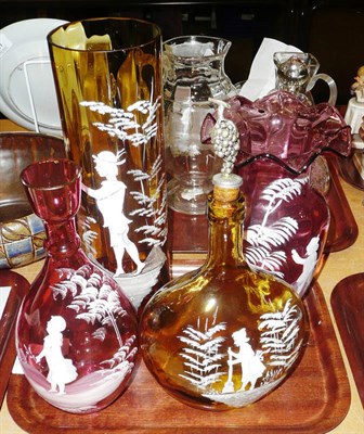 Lot 17 - Four Mary Gregory style items including cranberry glass bottle vase, cranberry vase, an amber glass