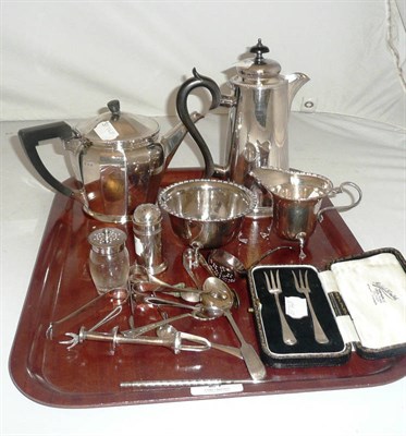 Lot 27 - A silver teapot, a silver sugar and cream and a quantity of silver and plated cutlery and a...