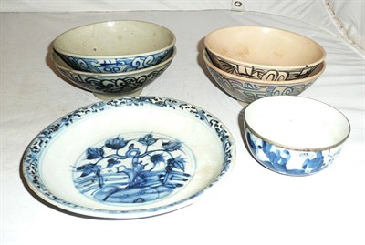 Lot 32 - Four Chinese provincial blue and white bowls, a dish and bowl with a metal rim