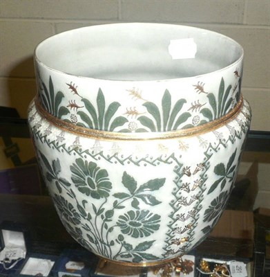 Lot 37 - A late Victorian Doulton stoneware vase with flowers on a celadon ground