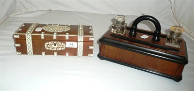 Lot 44 - A walnut writing stand with two glass inkwells and an Indian ivorine and sandalwood box