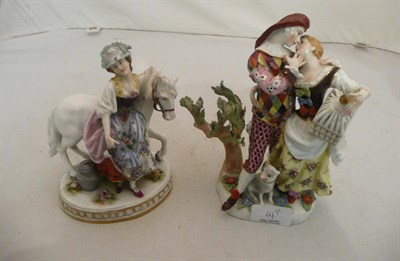 Lot 64 - A German group after Meissen, Comedia del Arte lovers and a German porcelain figure group of a girl