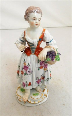 Lot 72 - A Meissen figure of a girl with a basket