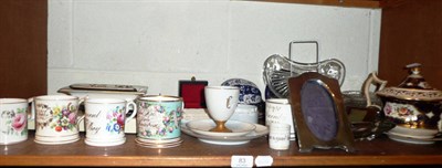 Lot 83 - A shelf of 19th century and later ceramics, silver picture frame etc