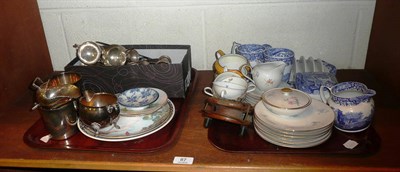 Lot 87 - A shelf of tea wares, Spode blue and white, three silver trophy cups and plated flatware etc